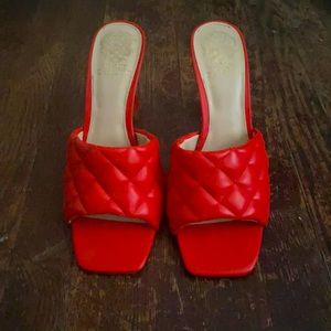 Beautiful red quilted heeled mules, never worn.